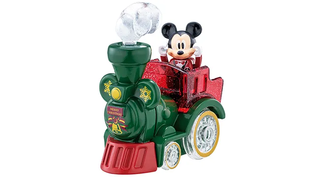 Disney Tomica Parade SP 米奇聖誕版官方商品照,綠色蒸汽火車頭造型,車頭印 MERRY CHRISTMAS 與金色鈴鐺