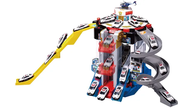 Tomica World 緊急出動警察署官方商品照，多層警察署搭配黃色滑道與螺旋道，頂樓有直升機